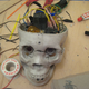 Illustration for article titled Make Your Own Animatronic Screaming Skull Brake Lights With Junkyard Parts!